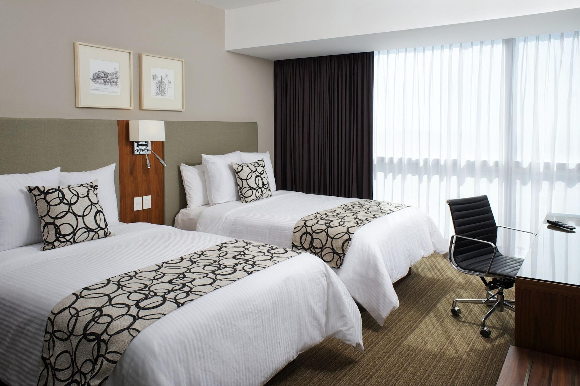 Casa Inn Premium Hotel Queretaro Miranda Eksteriør billede A room at the hotel