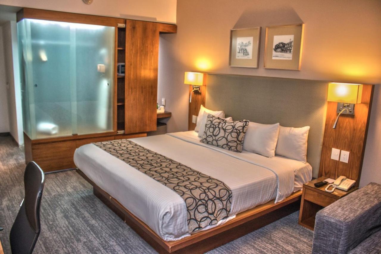 Casa Inn Premium Hotel Queretaro Miranda Eksteriør billede A room at the hotel